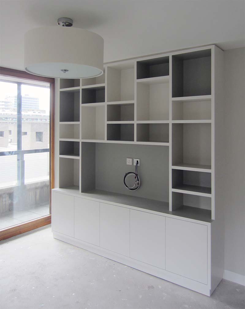 Custom-designed bespoke fitted joinery cabinetry in this Barbican Shakespeare Tower interior design project